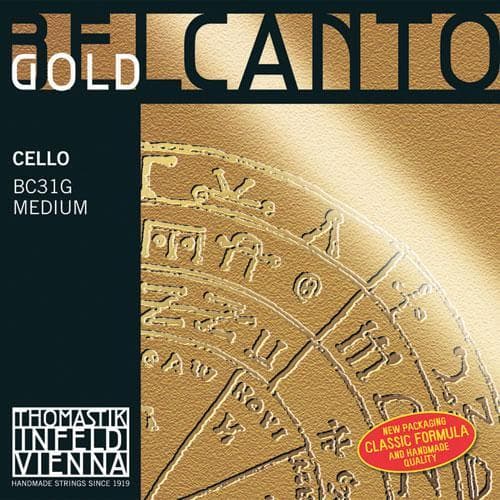 A gold-colored package of Thomastik-Infeld Vienna Belcanto Gold cello strings, labeled BC31G Medium. The package features circular symbols and text, with a "New Packaging" sticker in the lower right corner.