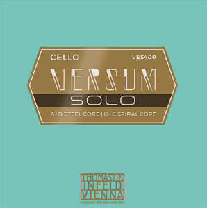A teal square label displays "Cello VES400 VERSUM SOLO" in gold and white text, indicating steel and spiral core strings. The Thomastik-Infeld Vienna logo appears at the bottom.